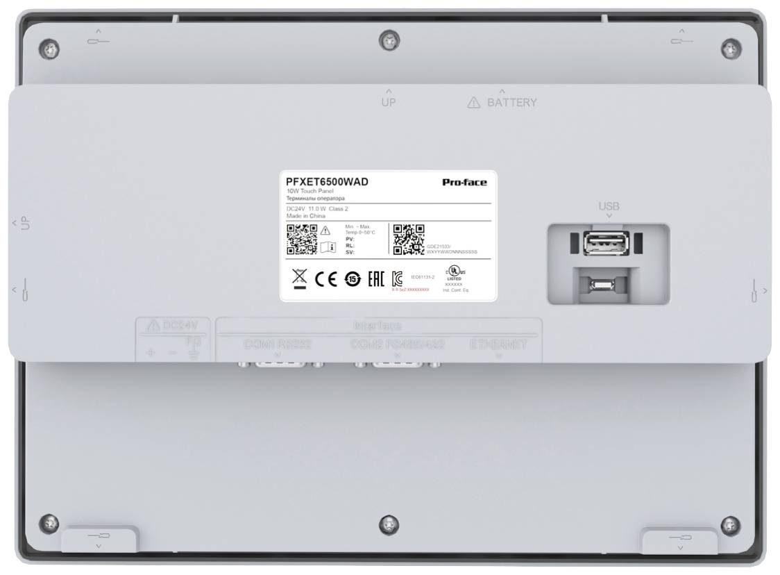 Tylna strona urządzenia elektronicznego z numerem modelu 'PFXET6500WAD', kodem kreskowym i złączem USB. Na górze znajdują się instrukcje dotyczące otwierania i zamykania.