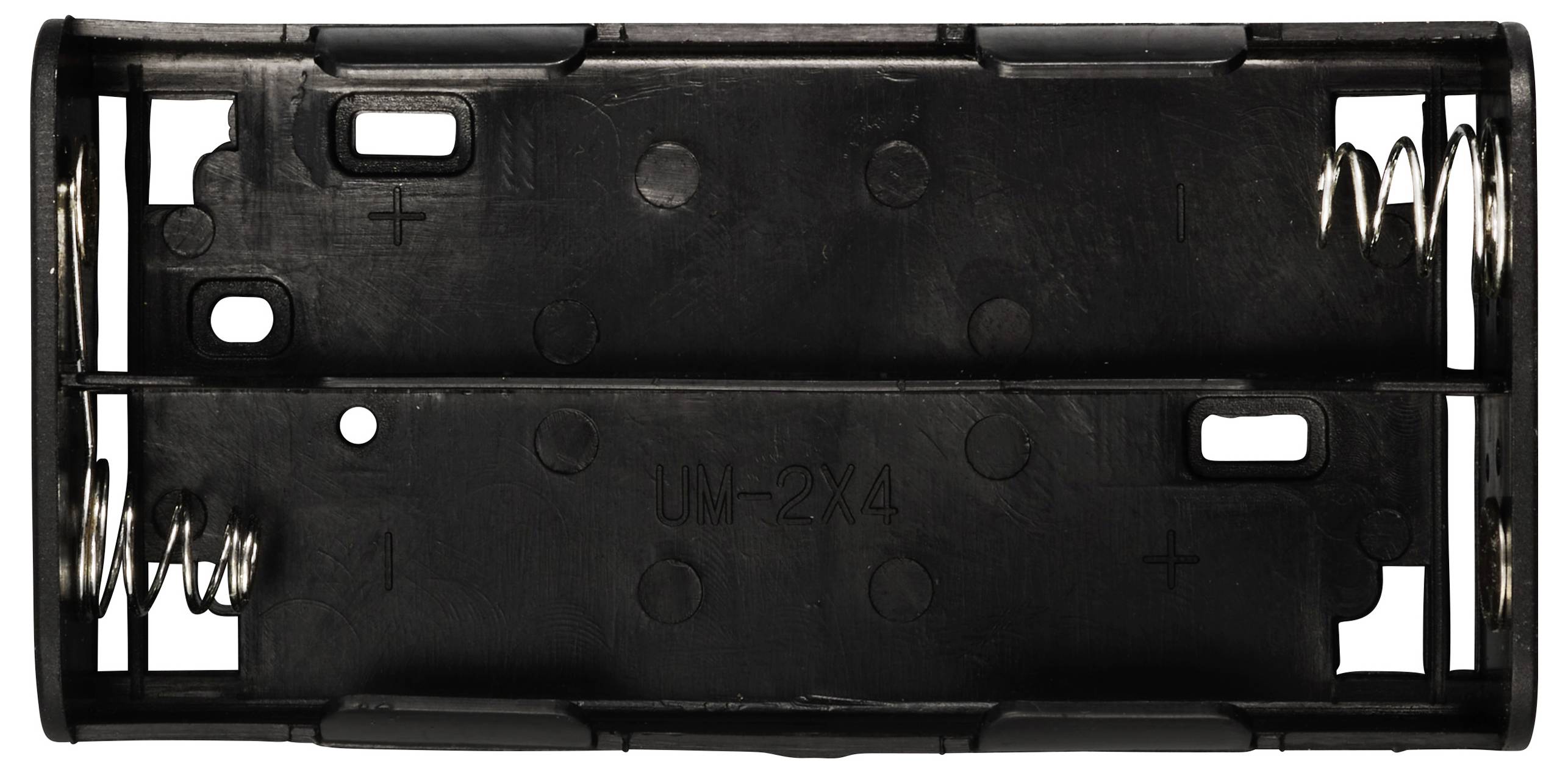 Czarna plastikowa obudowa baterii z sześcioma pustymi gniazdami i metalowymi sprężynami na obu końcach, przeznaczona do umieszczenia baterii AA.