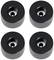 Cztery czarne kółka do deskorolek na białym tle, każde z centralnym otworem metalowym.