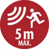 Czerwony okrągły znak ostrzegawczy z biegącą postacią, falami sygnału i tekstem „5 m MAX."