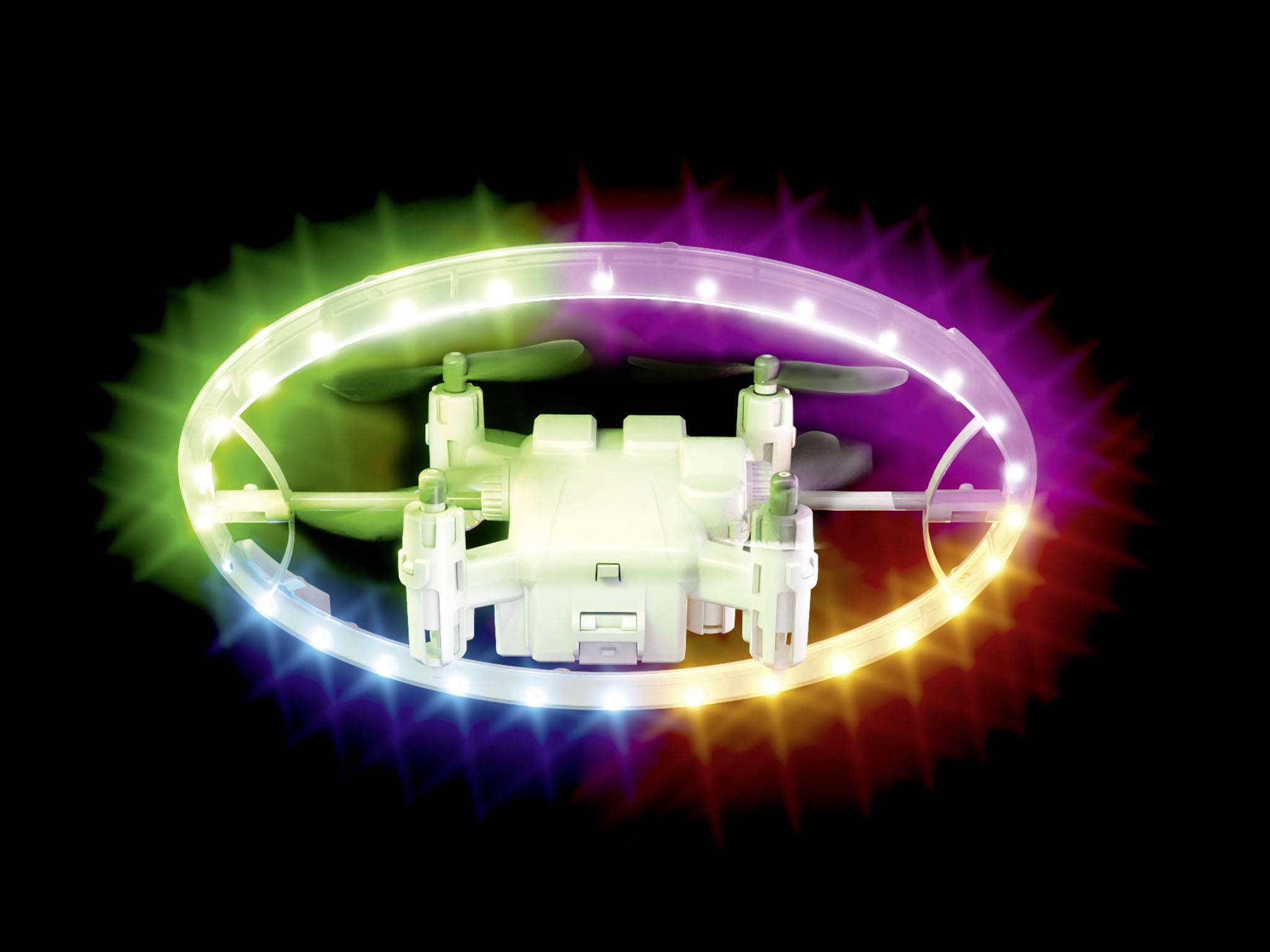 Biała dron otoczona lśniącym pierścieniem kolorowych świateł, unosi się na czarnym tle.