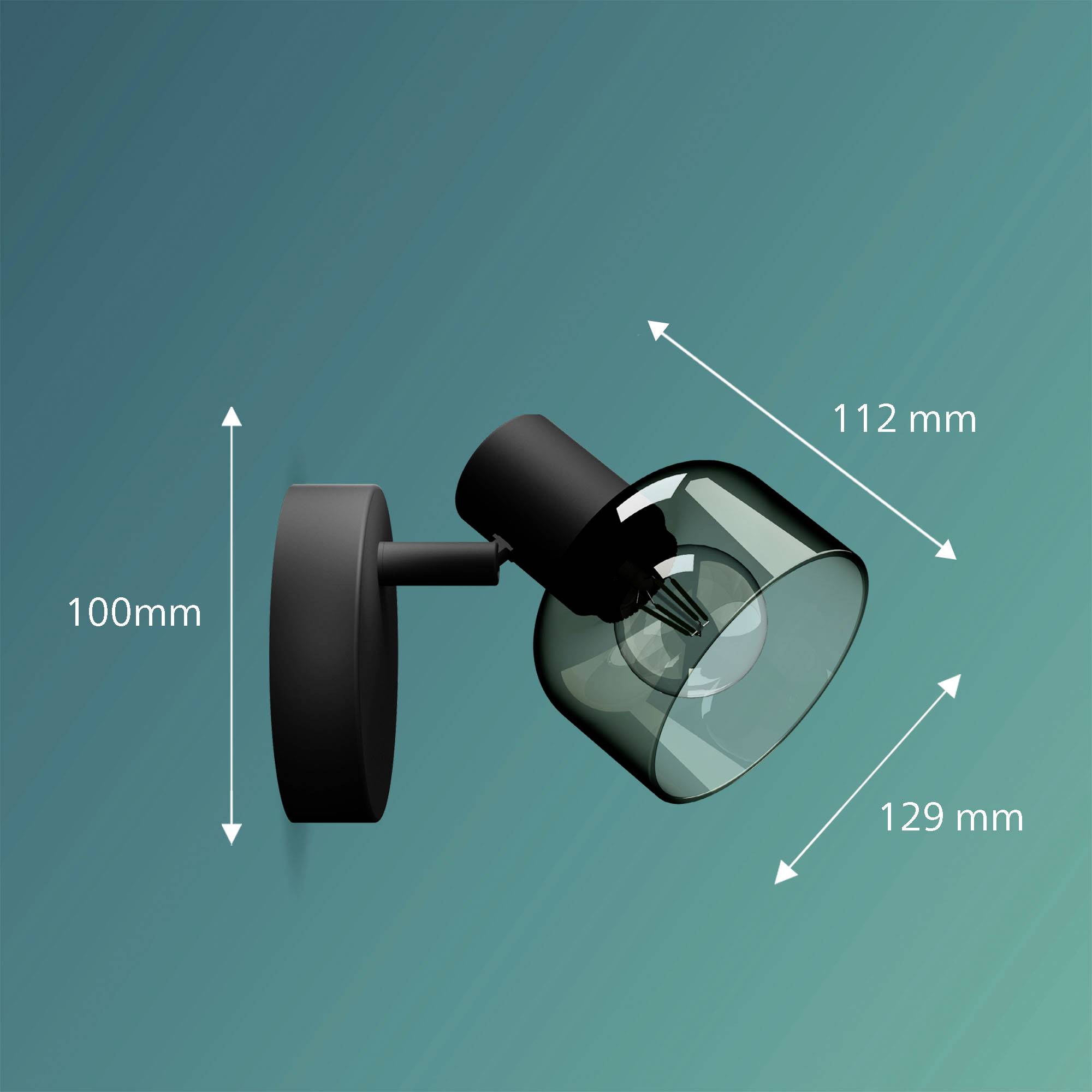 Czarna lampa ścienna ze szklanym kloszem. Wymiary: szerokość 129 mm, głębokość 112 mm, wysokość 100 mm. Posiada oprawkę na źródło światła.