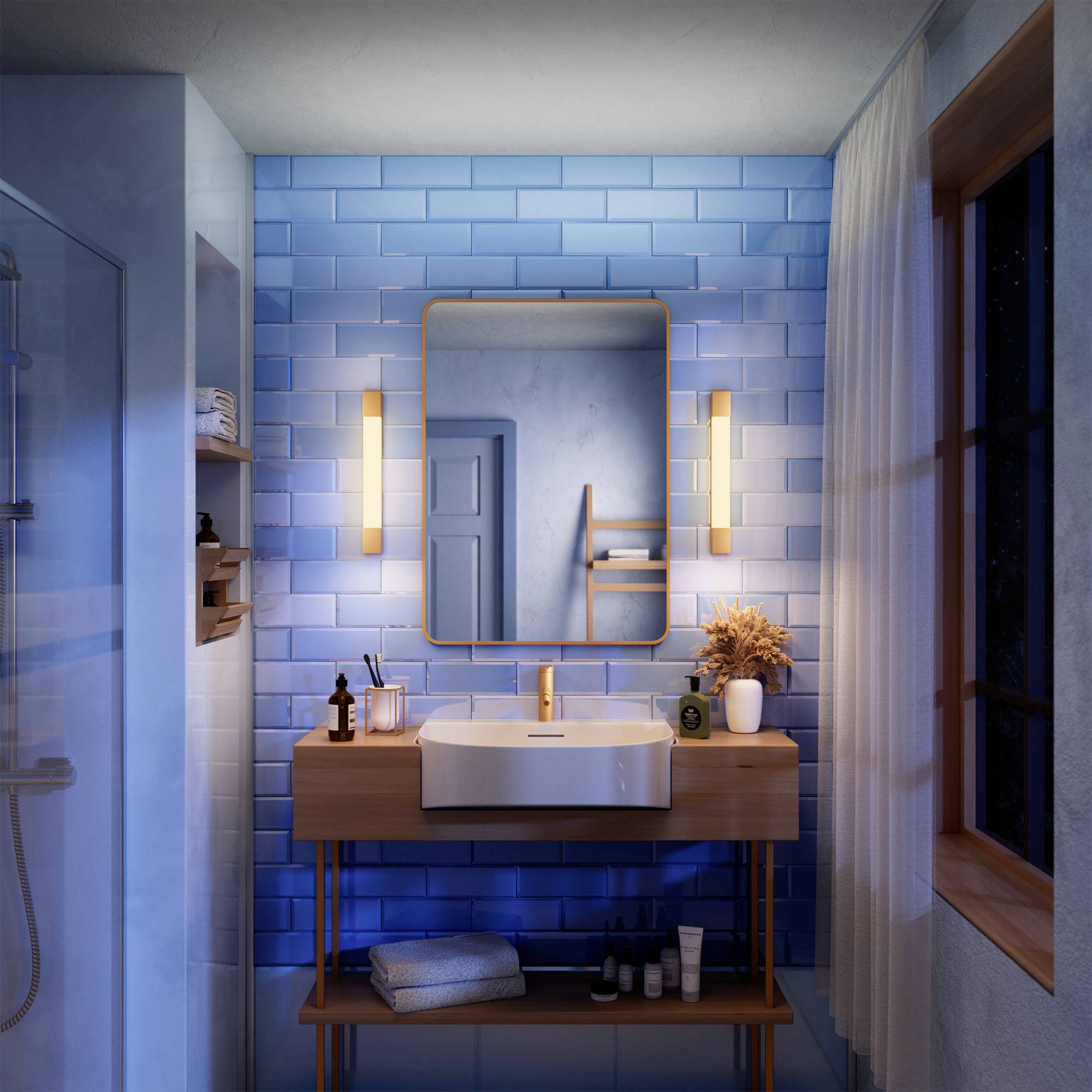 Nowoczesna łazienka z niebieską ścianą wyłożoną kafelkami, umywalką z drewnianą szafką podumywalkową i podświetlonym lustrem. Po lewej stronie prysznic.
