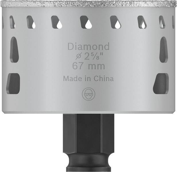 Szary diamentowy wiertnik z napisem 'Diamond ø 2 5/8" 67 mm Wyprodukowano w Chinach'. Korona wiertnicza z otworami bocznymi.