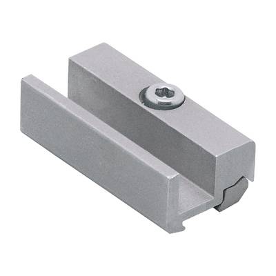 Metalowy element na czarnym tle, z wkrętem u góry. Prawdopodobnie przeznaczony do zastosowań mechanicznych lub przemysłowych.