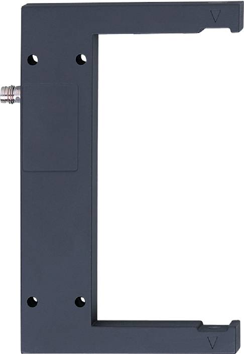 Prostokątne metalowe pudełko w kolorze szarym z małym złączem z boku, prawdopodobnie element urządzenia elektronicznego.