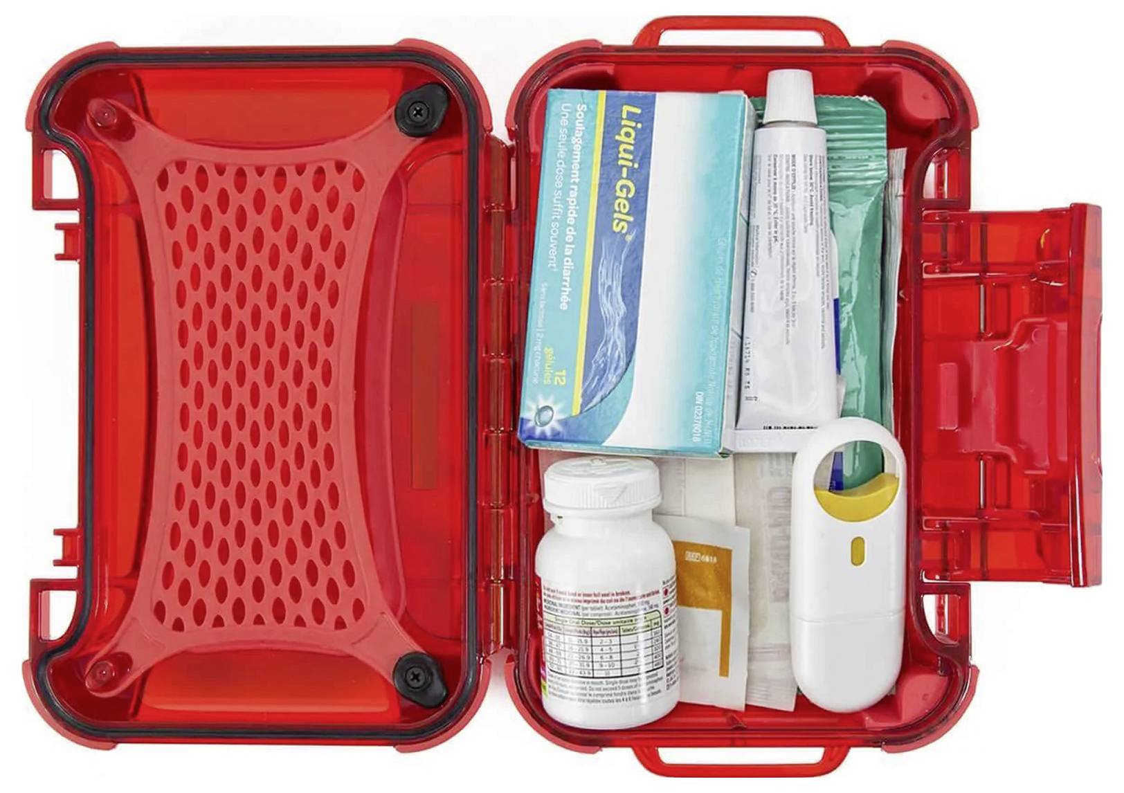Otwarte, czerwone pudełko pierwszej pomocy z lekami, maściami i inhalatorem, gotowe na wypadek nagłych zdarzeń.