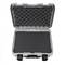 Szary, otwarty futerał ochronny z czarną wewnętrzną wyściółką z pianki, odpowiedni do bezpiecznego transportu delikatnych przedmiotów.