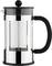 Dzbanek do zaparzania French Press z czarnym uchwytem i pokrywką. Przezroczysty szklany cylinder w metalowej oprawie, idealny do przyrządzania kawy.