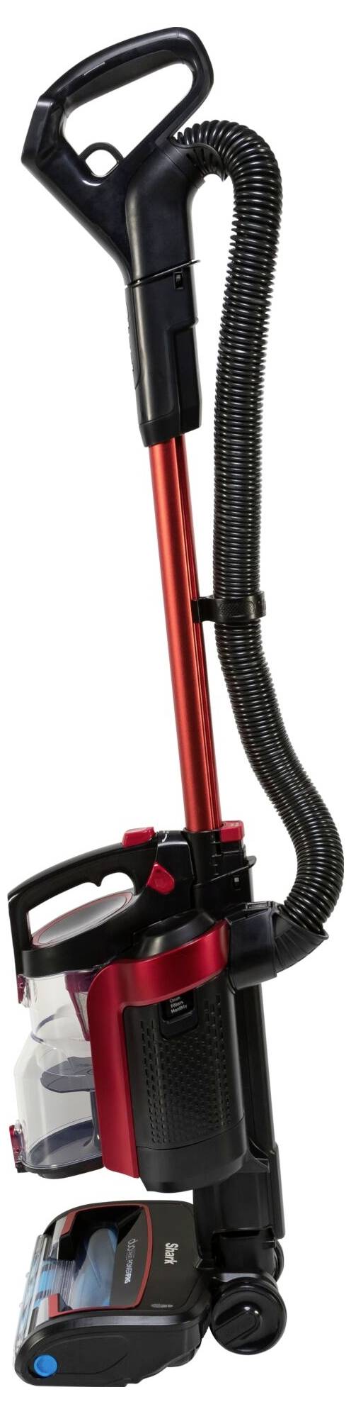 Czerwony, bezprzewodowy odkurzacz z czarną rączką, przezroczystym zbiornikiem na kurz i elastyczną końcówką ssącą, ustawiony pionowo.