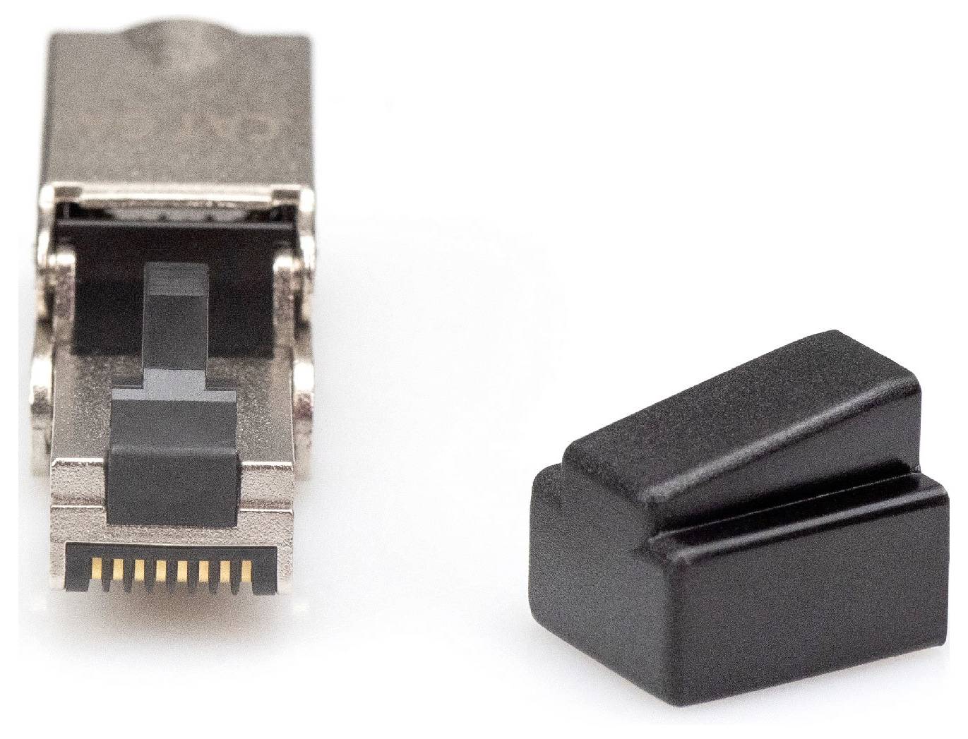 Wtyczka metalowa z czarnymi plastikowymi osłonkami, typowo używana do kabli sieciowych, obok zdjętej plastikowej nasadki.