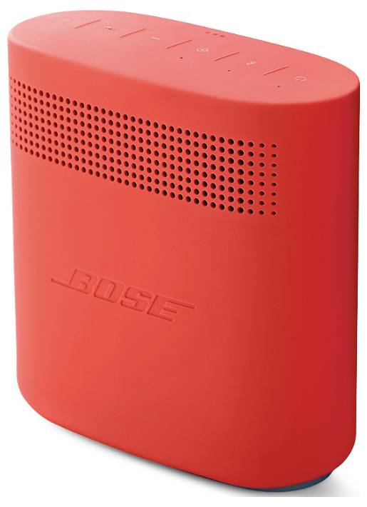Przenośny, czerwony głośnik z przyciskami sterującymi na górze i logo marki 'Bose' pośrodku.