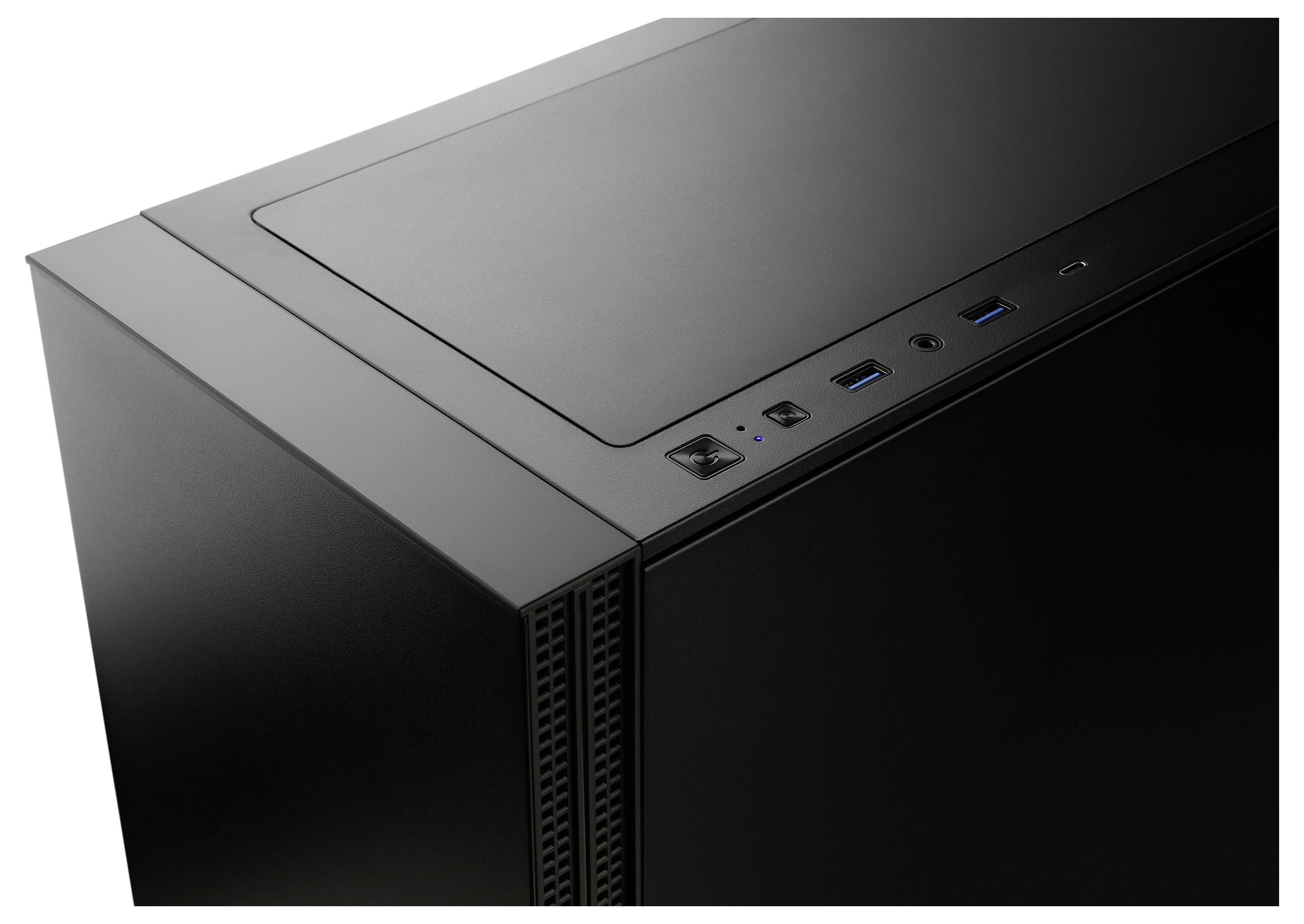 Czarna obudowa komputera z portami USB i dużym włącznikiem sieciowym na górnej powierzchni. Minimalistyczny design.