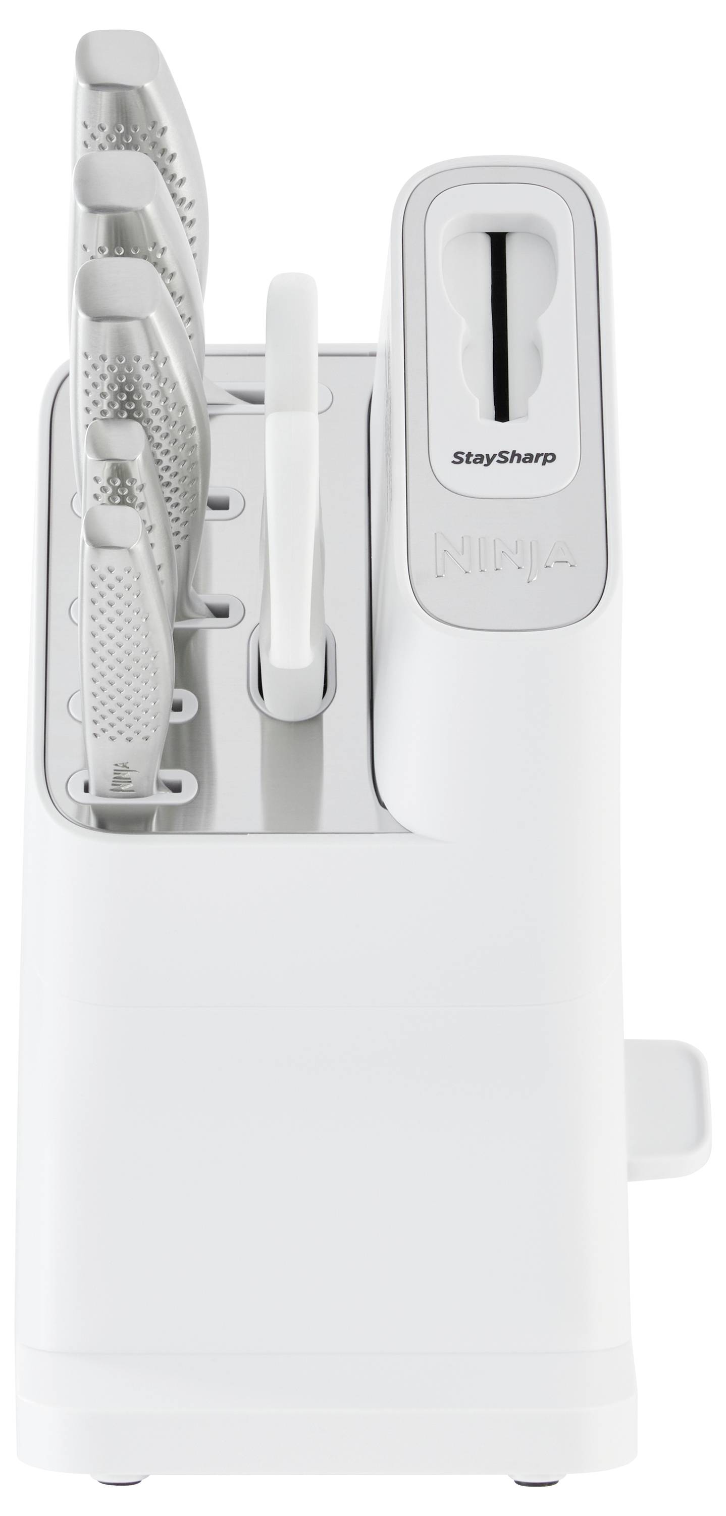 Biały blok na noże z czterema nożami i wbudowaną ostrzałką, wszystkie noże są umieszczone w specjalnych szczelinach.