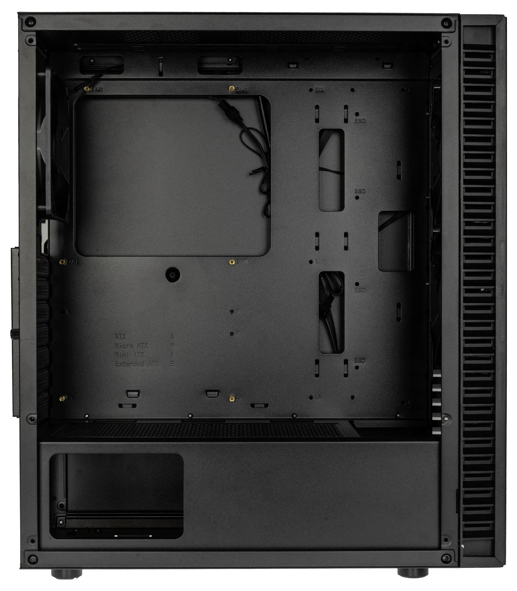 Otwarta obudowa komputera bez podzespołów, ukazująca różne wnęki i przepusty kablowe we wnętrzu.