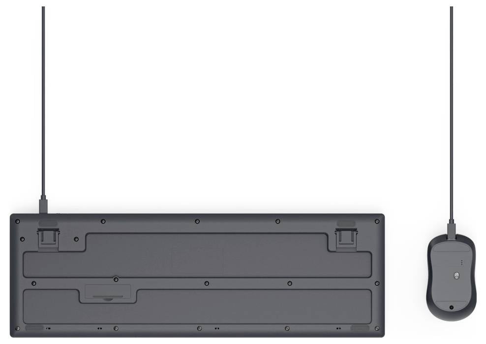 Czarna klawiatura i mysz, obie przewodowe, sfotografowane od tyłu.