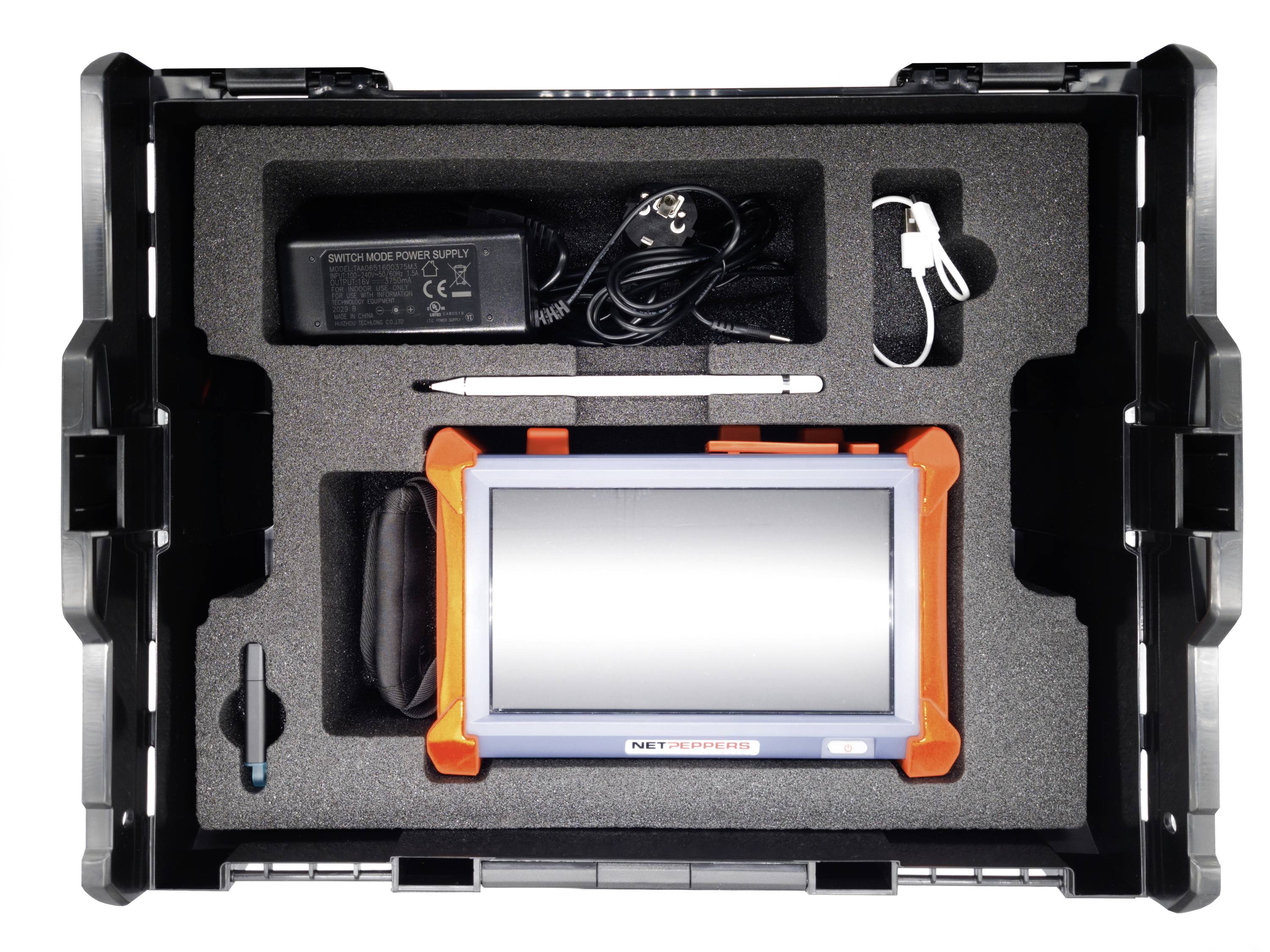 Przenośny monitor diagnostyczny w walizce z zasilaczem, kablem i rysikiem. Monitor nie wyświetla żadnej treści ekranu.