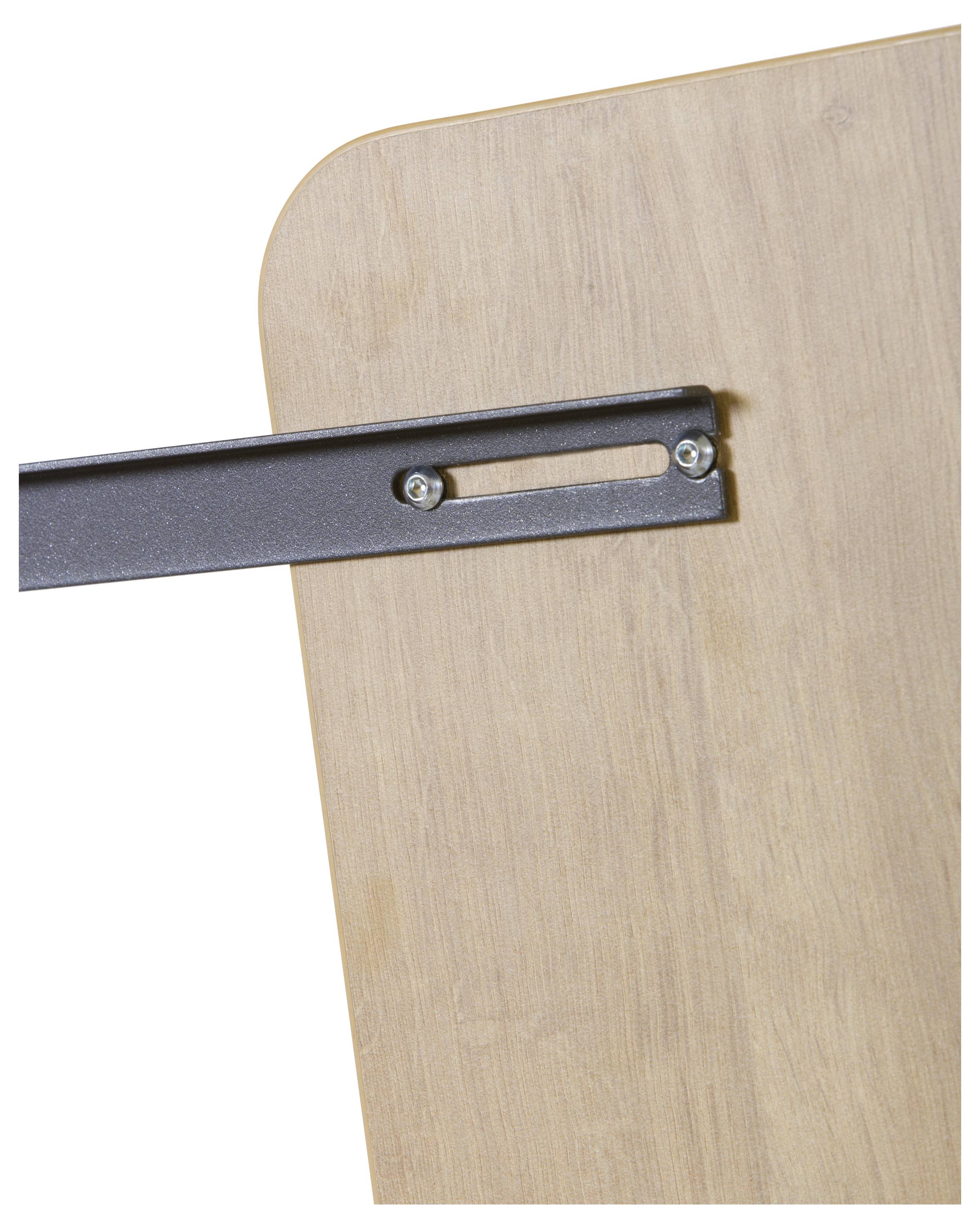 Zbliżenie prostokątnej drewnianej płyty o zaokrąglonym rogu, do której przymocowana jest czarna metalowa część za pomocą śrub.