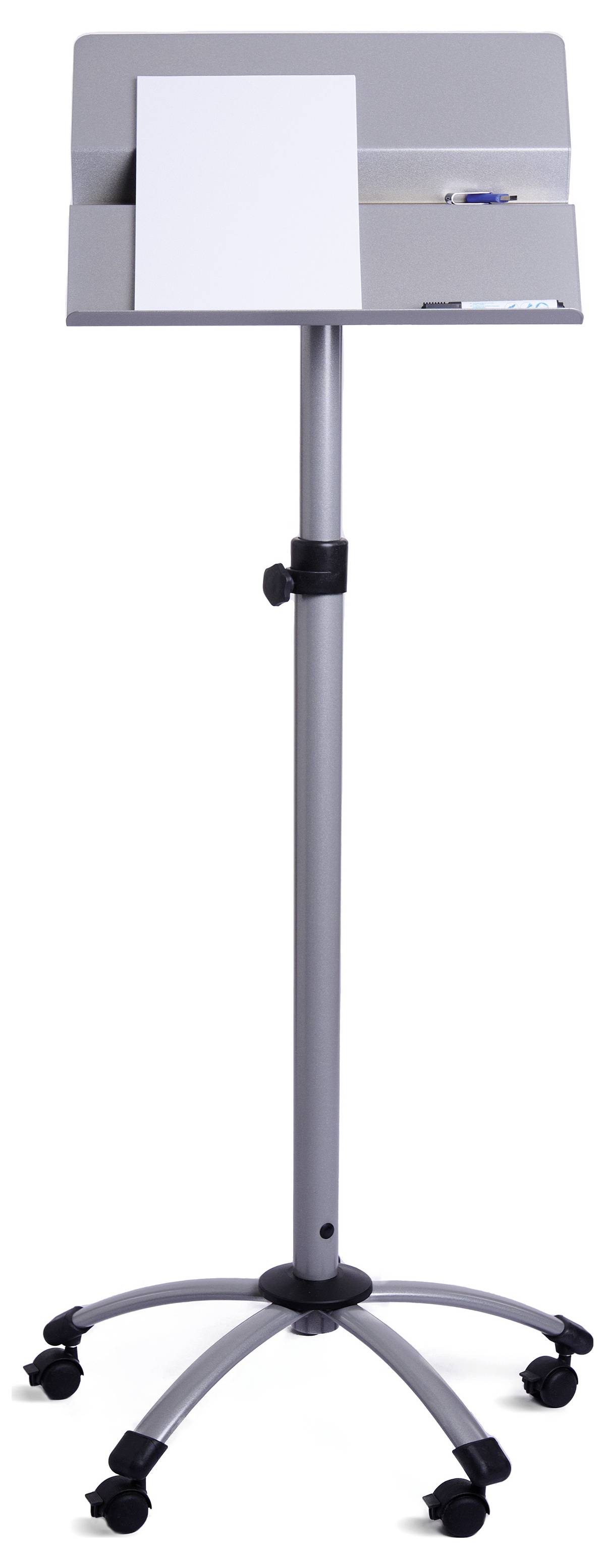 Srebrowa, regulowana wysokościowo mównica na kółkach. Na górze leży pusta kartka papieru i niebieski długopis.