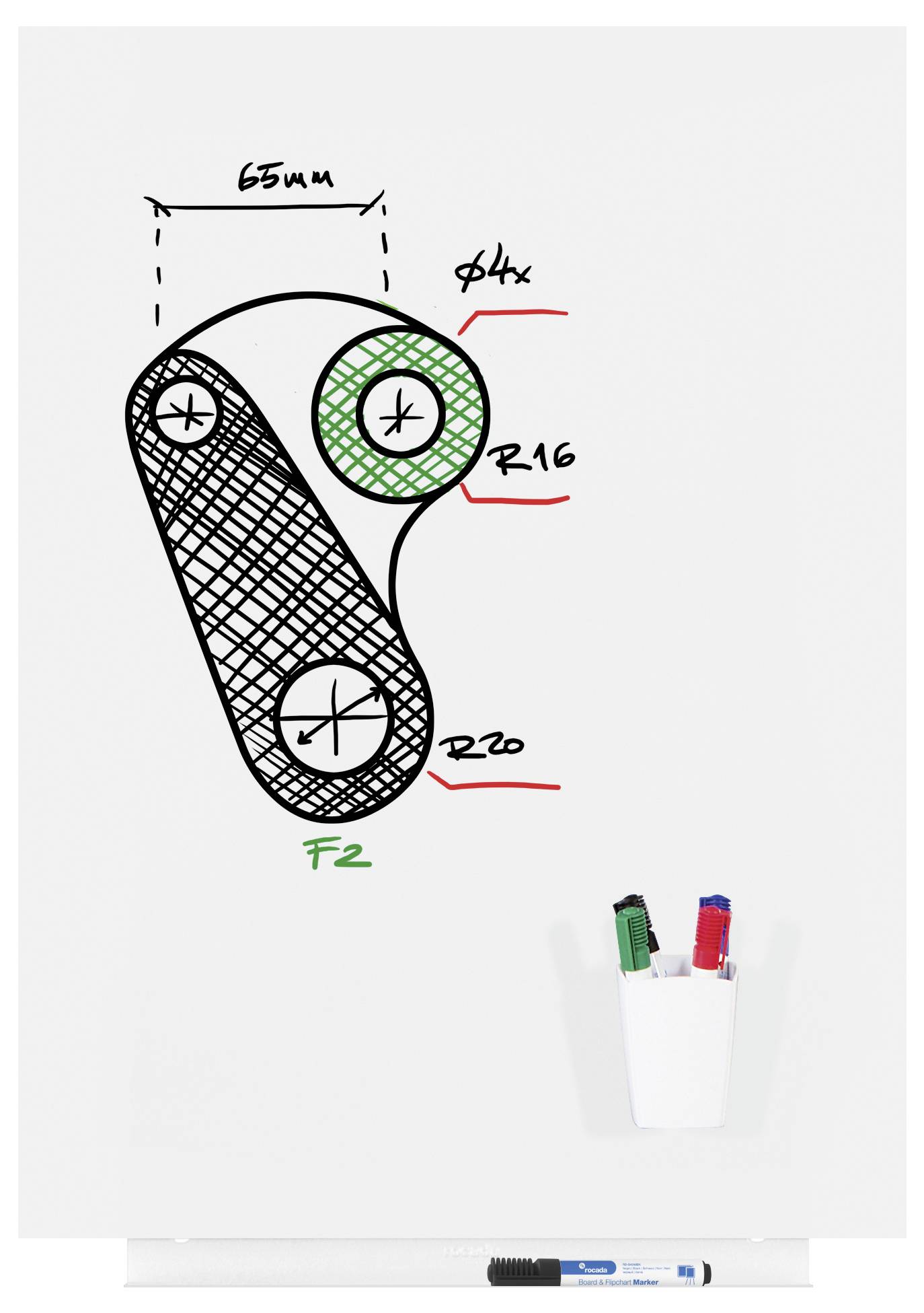 Rysunek techniczny części mechanicznej z wymiarami i opisami. U dołu zamocowany jest pojemnik z trzpieniami.