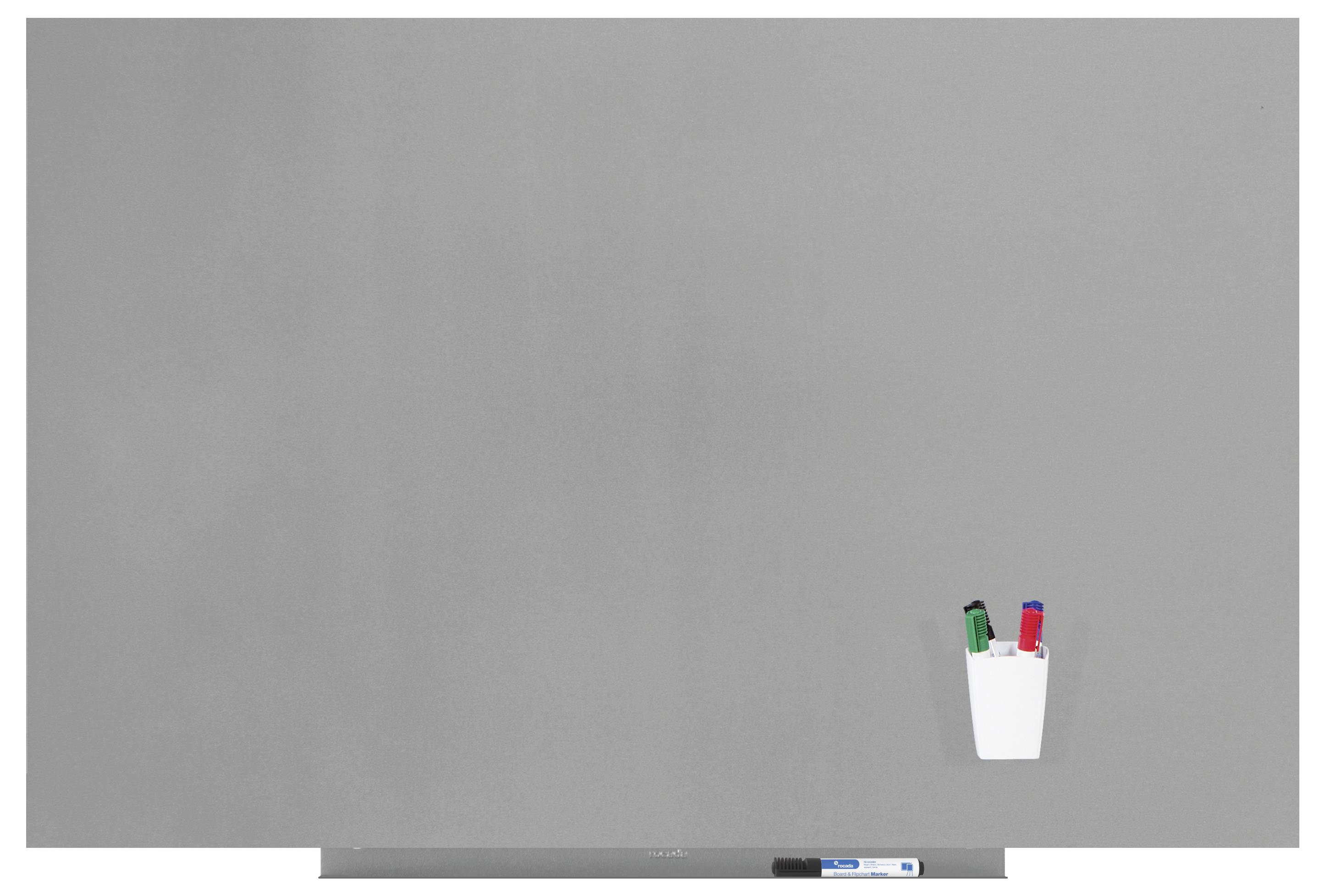 Szara tablica ścienna z białym pojemnikiem zawierającym zielone i czerwone markery; na dole wisi dodatkowy marker.