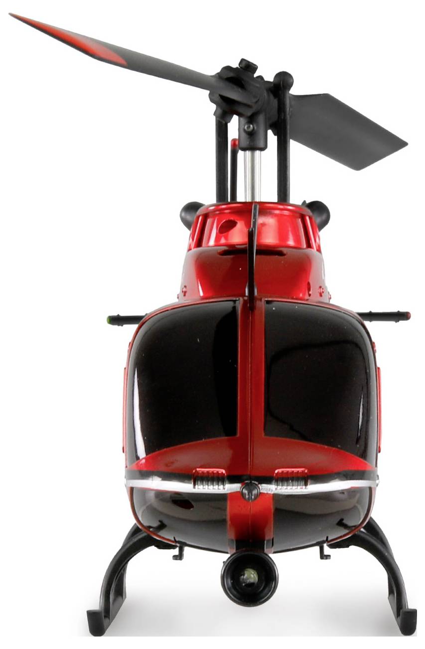 Czerwony zdalnie sterowany helikopter z dwoma łopatami wirnika stoi pionowo. Widok z przodu ukazuje kamerę i podwozie.