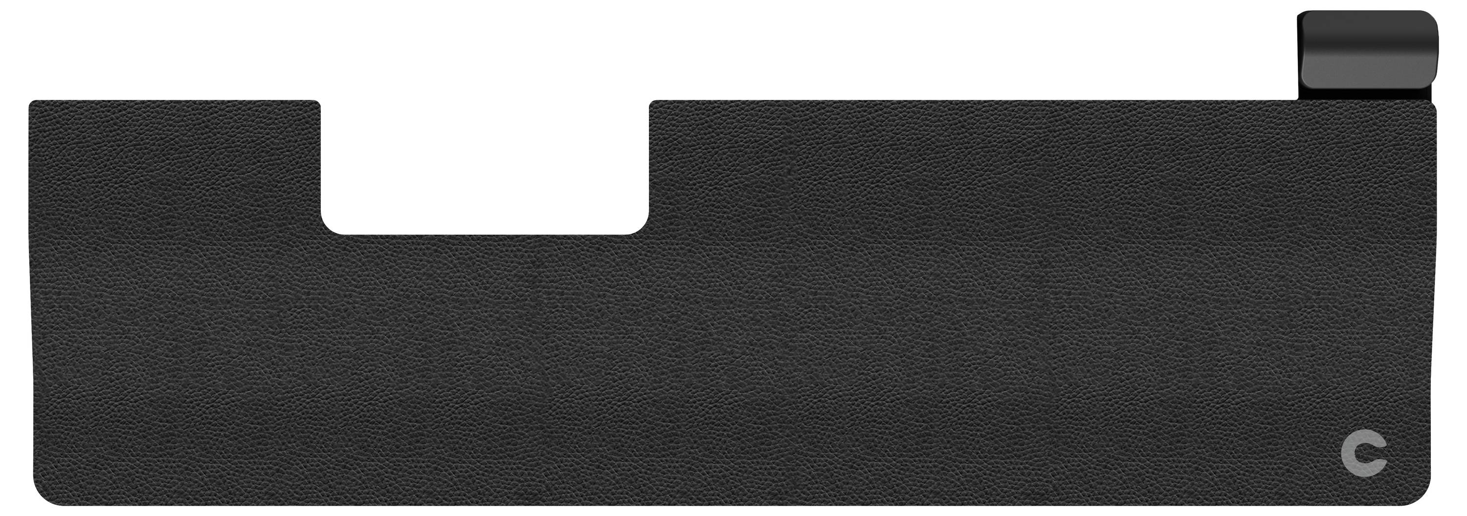 Czarny, prostokątny przedmiot z wgłębieniem i okrągłym obszarem w górnym prawym rogu.