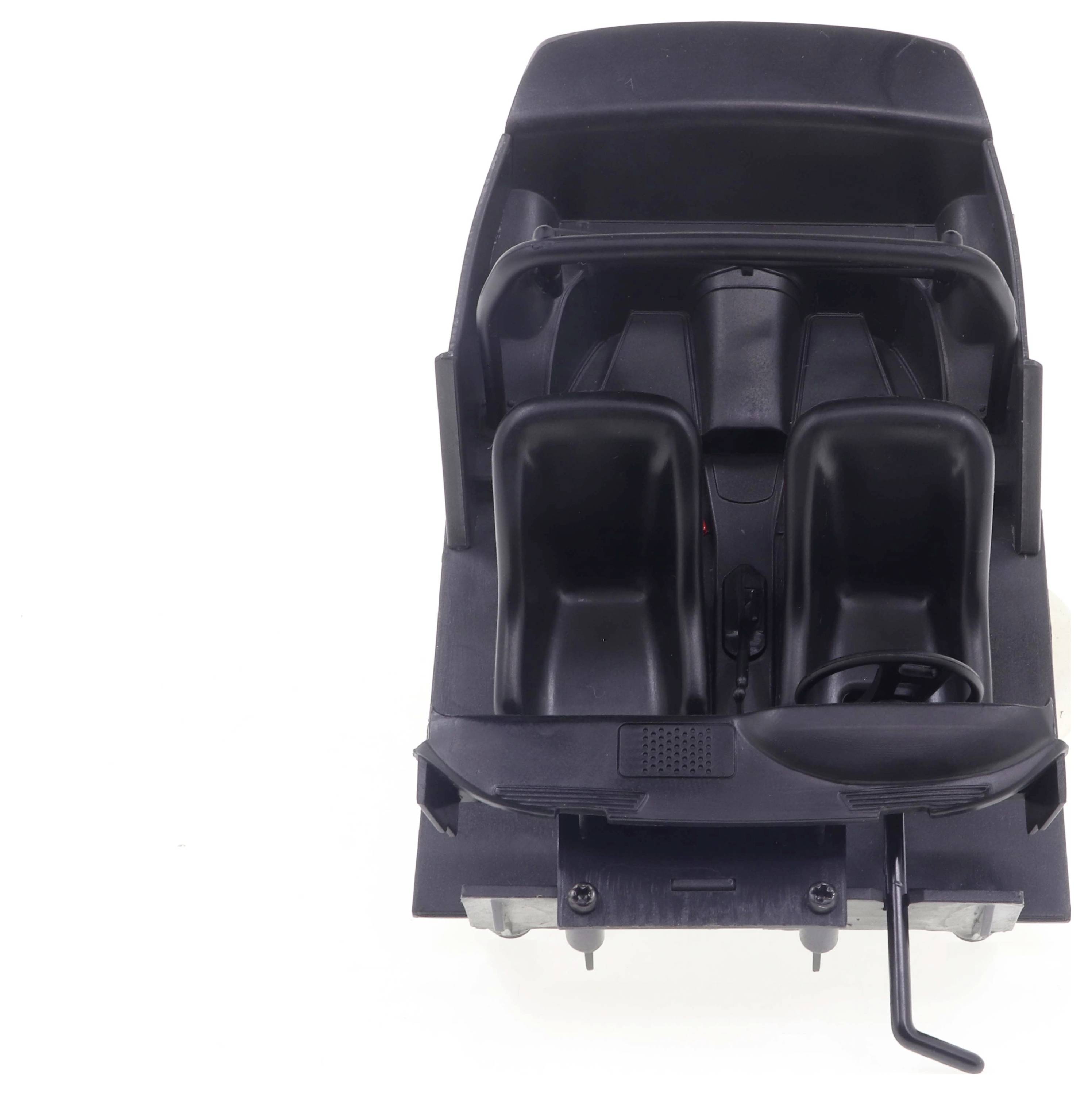 Modelowy samochodzik z dwoma miejscami siedzącymi i kierownicą. Widok z góry, prosty, czarny wnętrz.