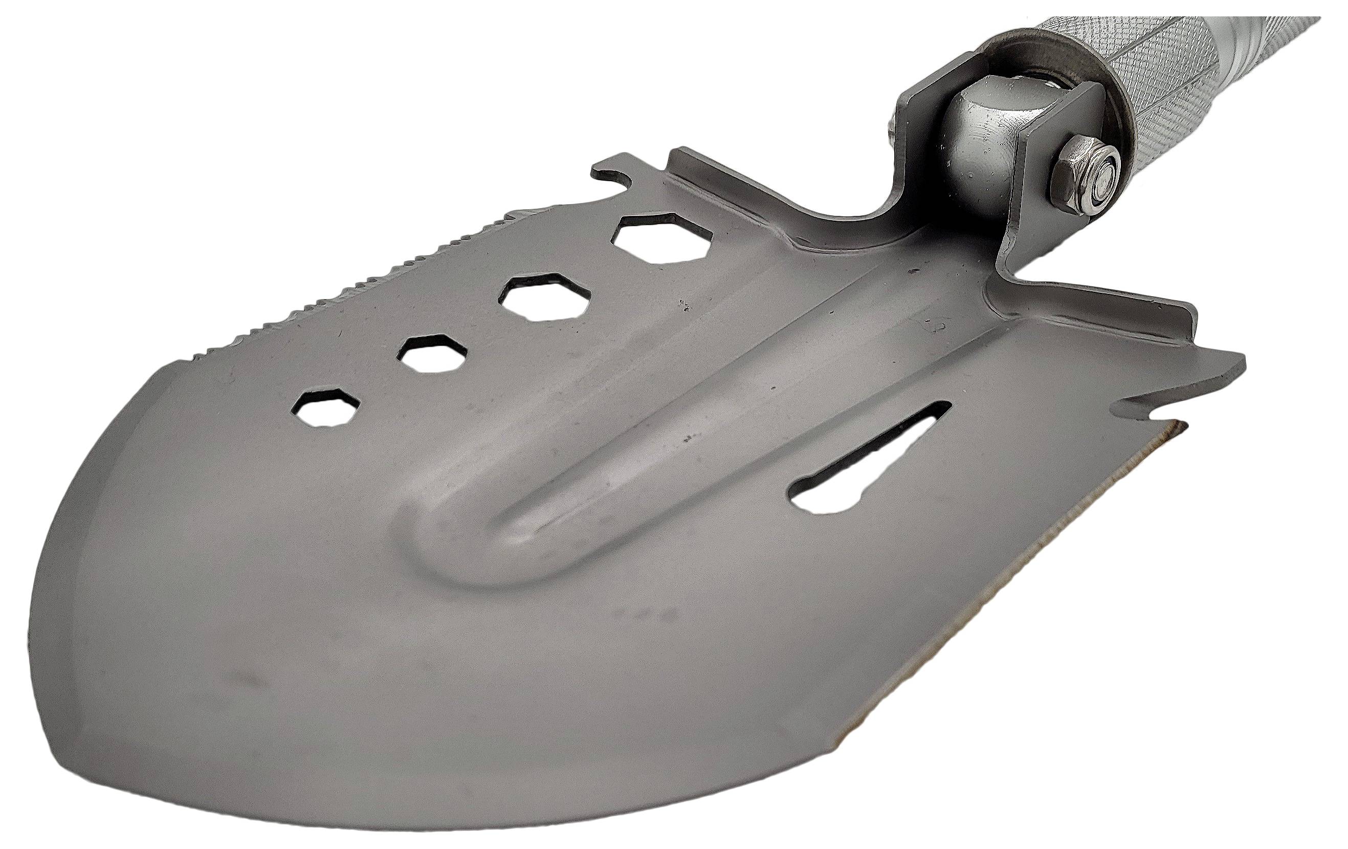 Kompaktowa, szara łopata z kilkoma sześciokątnymi i podłużnymi wycięciami wzdłuż ostrza, przymocowana do solidnego uchwytu.