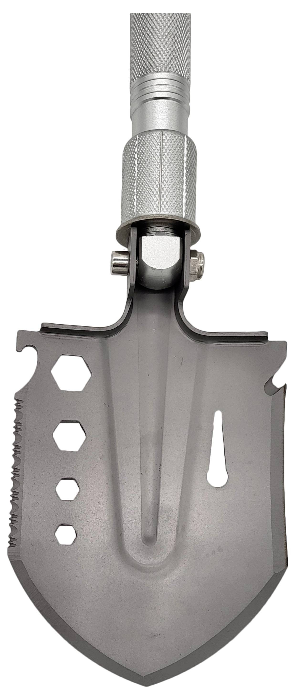 Łopatka taktyczna z ząbkowanymi krawędziami i sześciokątnymi otworami na płaszczyźnie. Nadaje się do kampingu lub aktywności na świeżym powietrzu.