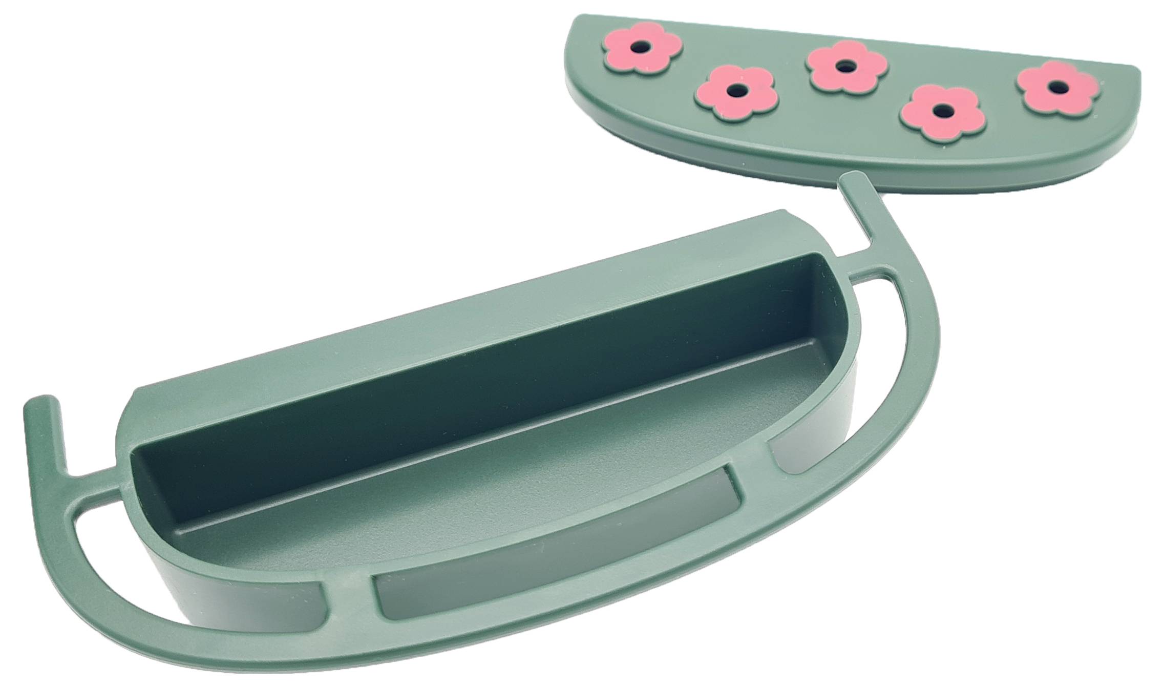 Zielony uchwyt z zdejmowaną pokrywą, ozdobiony różowymi kwiatami.