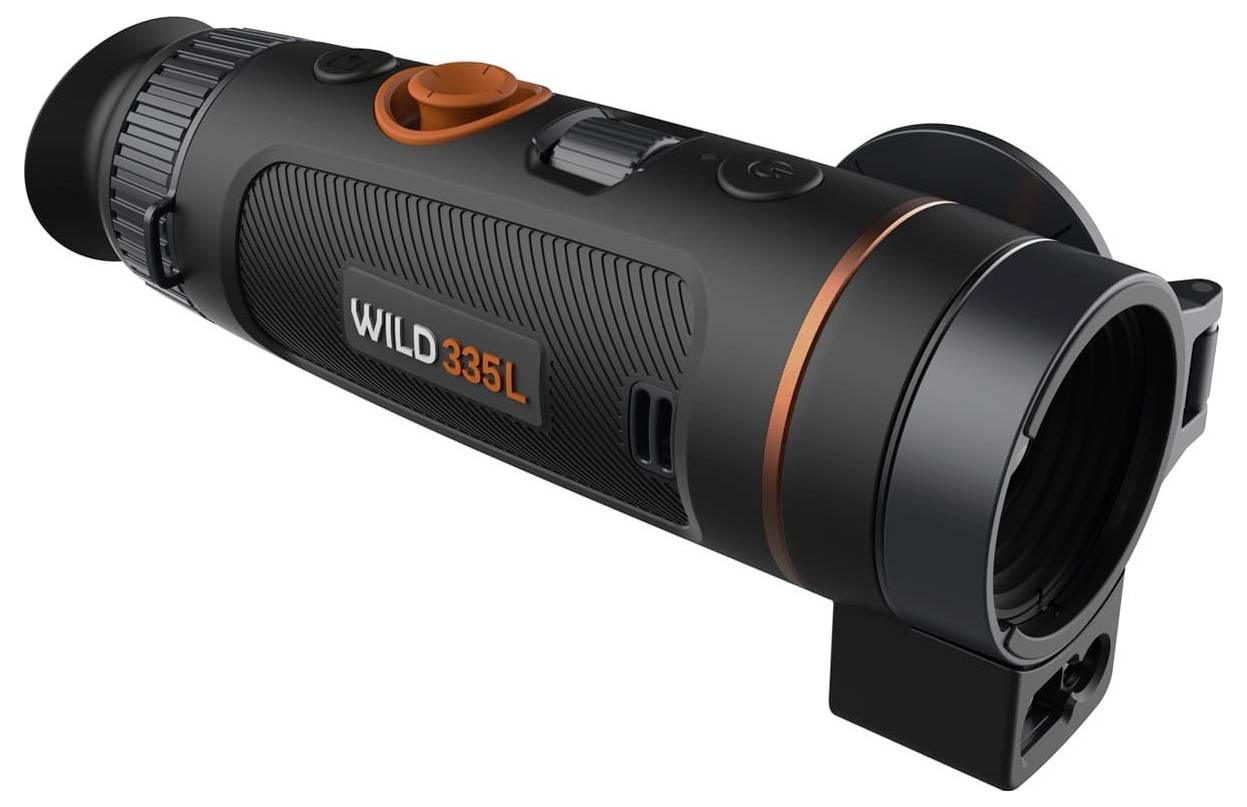 Przenośne urządzenie noktowizyjne sfotografowane z boku, z oznaczeniem 'WILD335L', w czarnej obudowie z pomarańczowym pierścieniem i obiektywem.