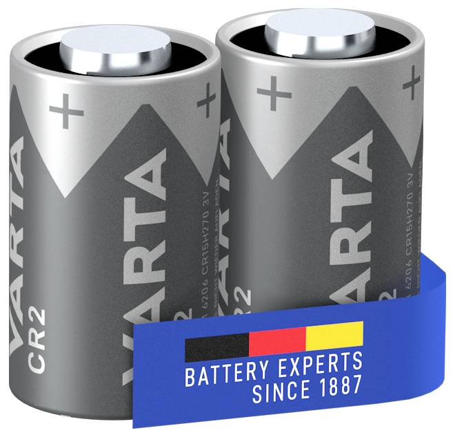 Dwie szare baterie VARTA typu CR2, stojące obok siebie, z niebieskim banerem z napisem 'BATTERY EXPERTS SINCE 1887'.