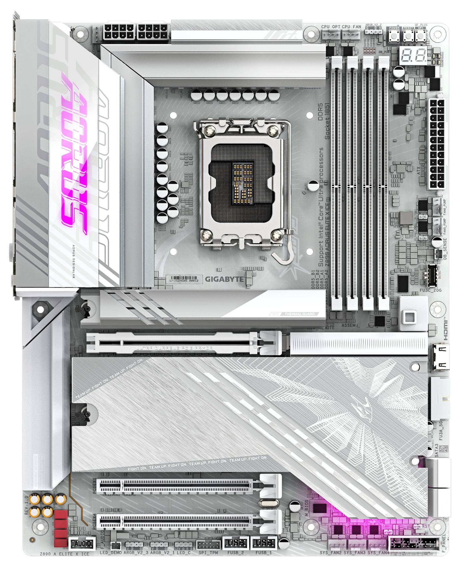 Szara biała płyta główna komputera widziana z góry z wieloma slotami, w tym gniazdem procesora CPU, bankami pamięci RAM i interfejsami PCIe.