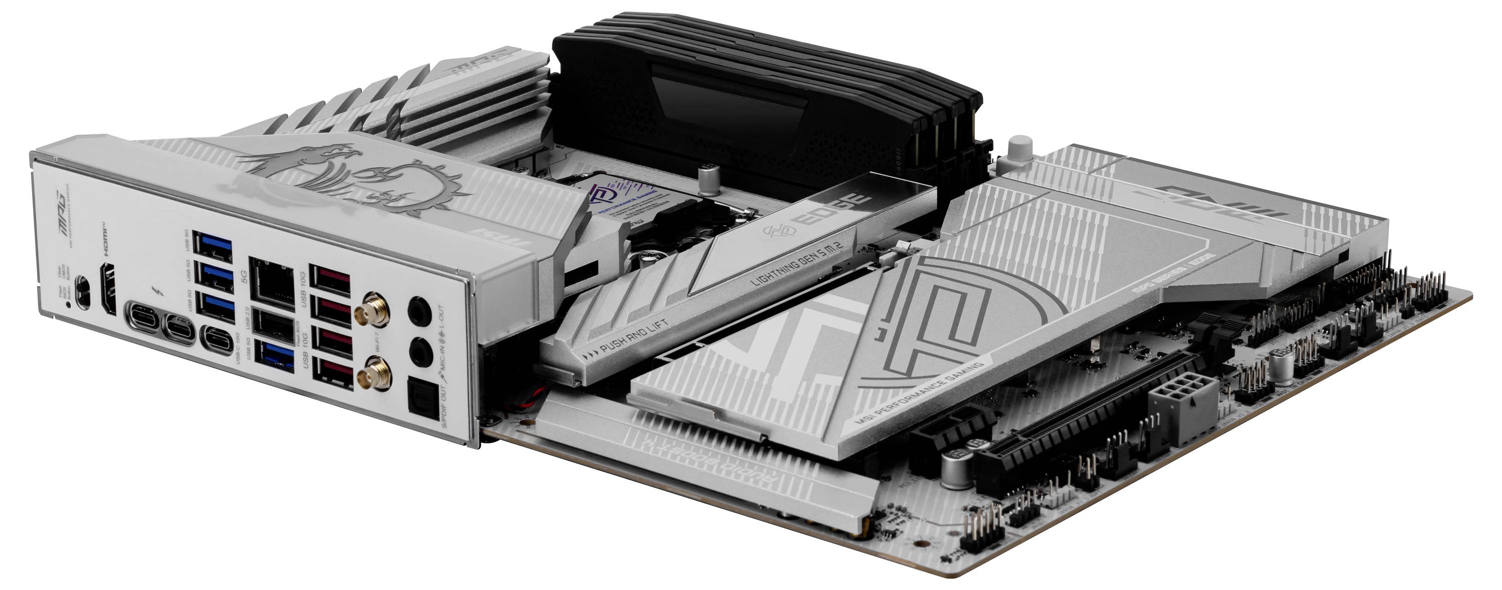 Szara płyta główna komputera PC z wieloma slotami PCIe, radatorami i różnymi złączami, w tym HDMI, portami USB oraz gniazdami audio.