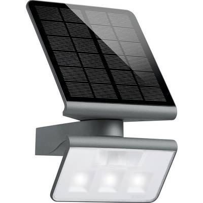 Solarna lampa ścienna z panelem słonecznym na górze i diodami LED na dole, odpowiednia do użytku na zewnątrz.