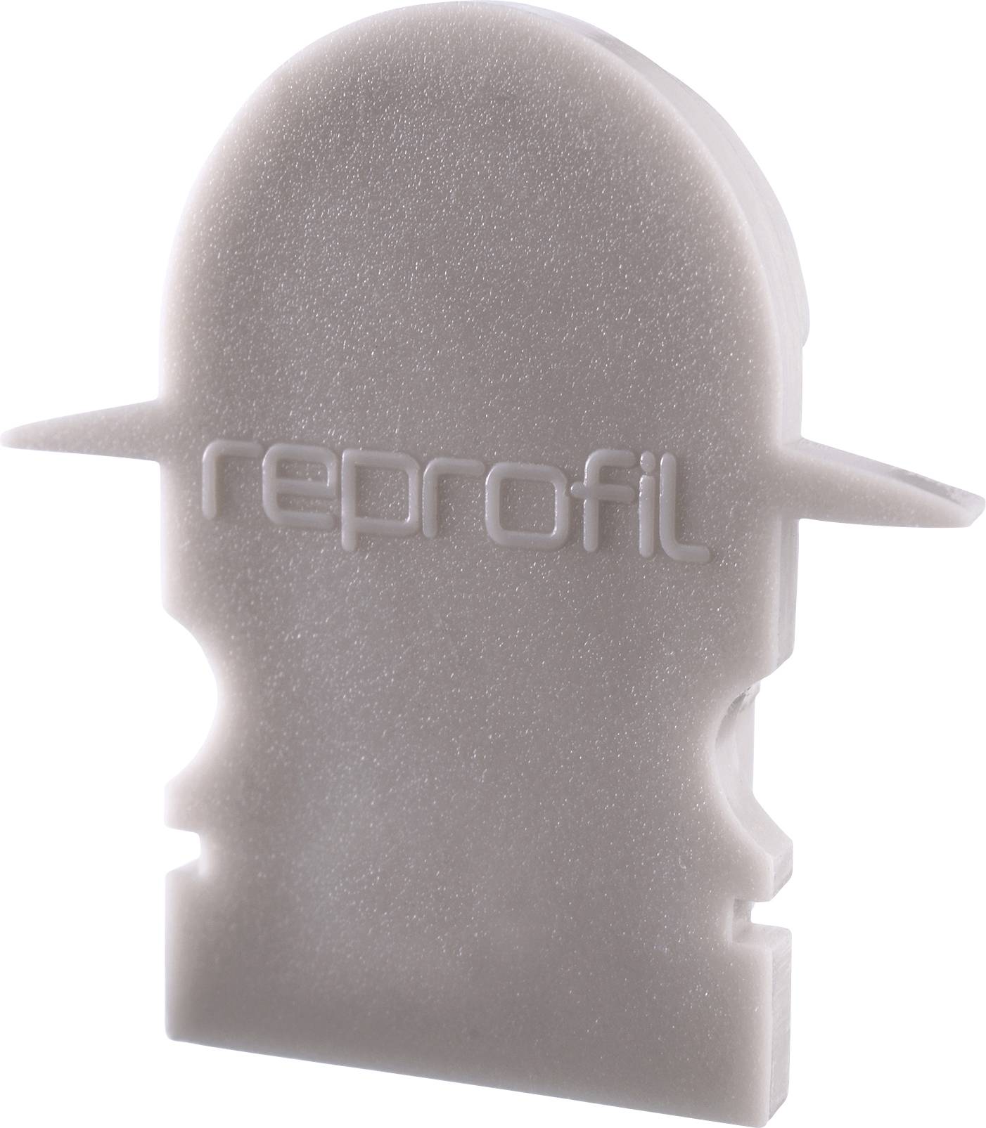 Szare plastikowe urządzenie z napisem 'reprofil', o rzeźbiarskim kształcie z wypukłymi krawędziami i zaokrągloną górną powierzchnią.