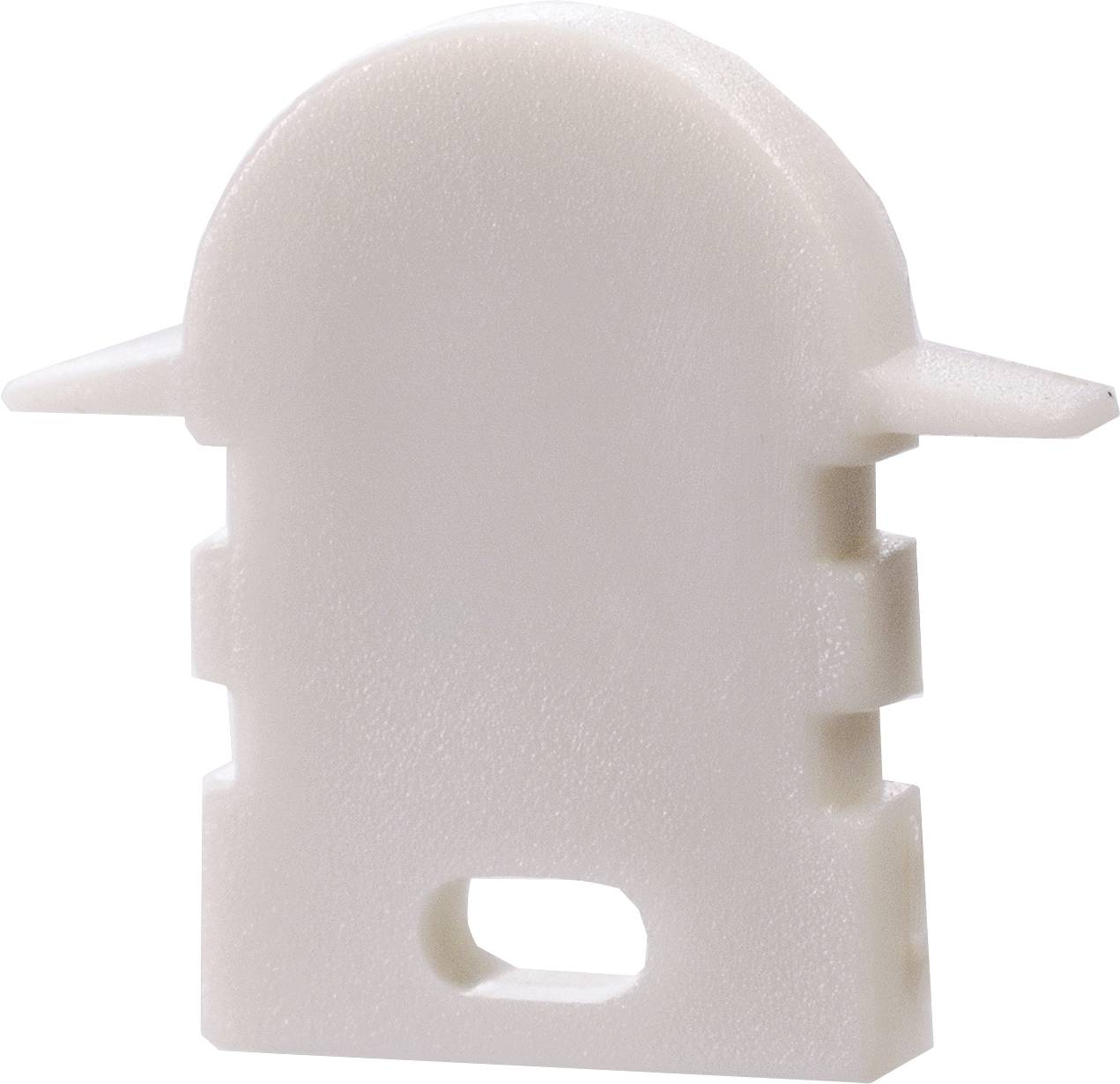 Biały, przypominający tworzywo sztuczne obiekt z zaokrągloną górną częścią, dwoma bocznymi występami i prostokątnymi wycięciami w dolnej połowie.