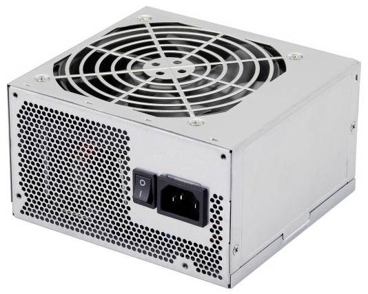 Srebrny zasilacz komputerowy z wentylatorem i złączami zasilania z tyłu. Wentylator umieszczony za metalową kratką.