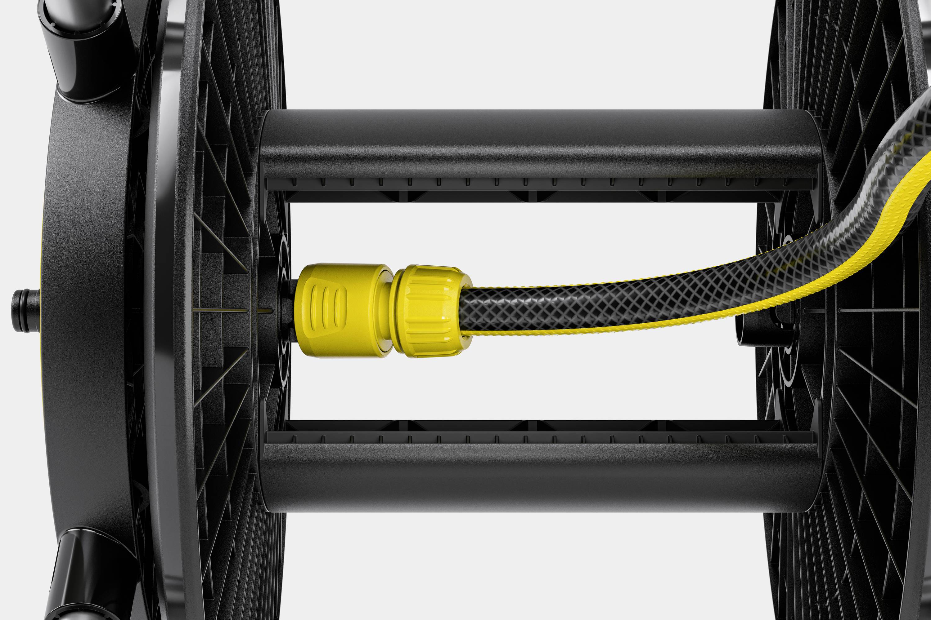 Zbliżenie bębna na wąż z czarno-żółtym wężem przymocowanym pośrodku. Czarno-żółta kolorystyka.