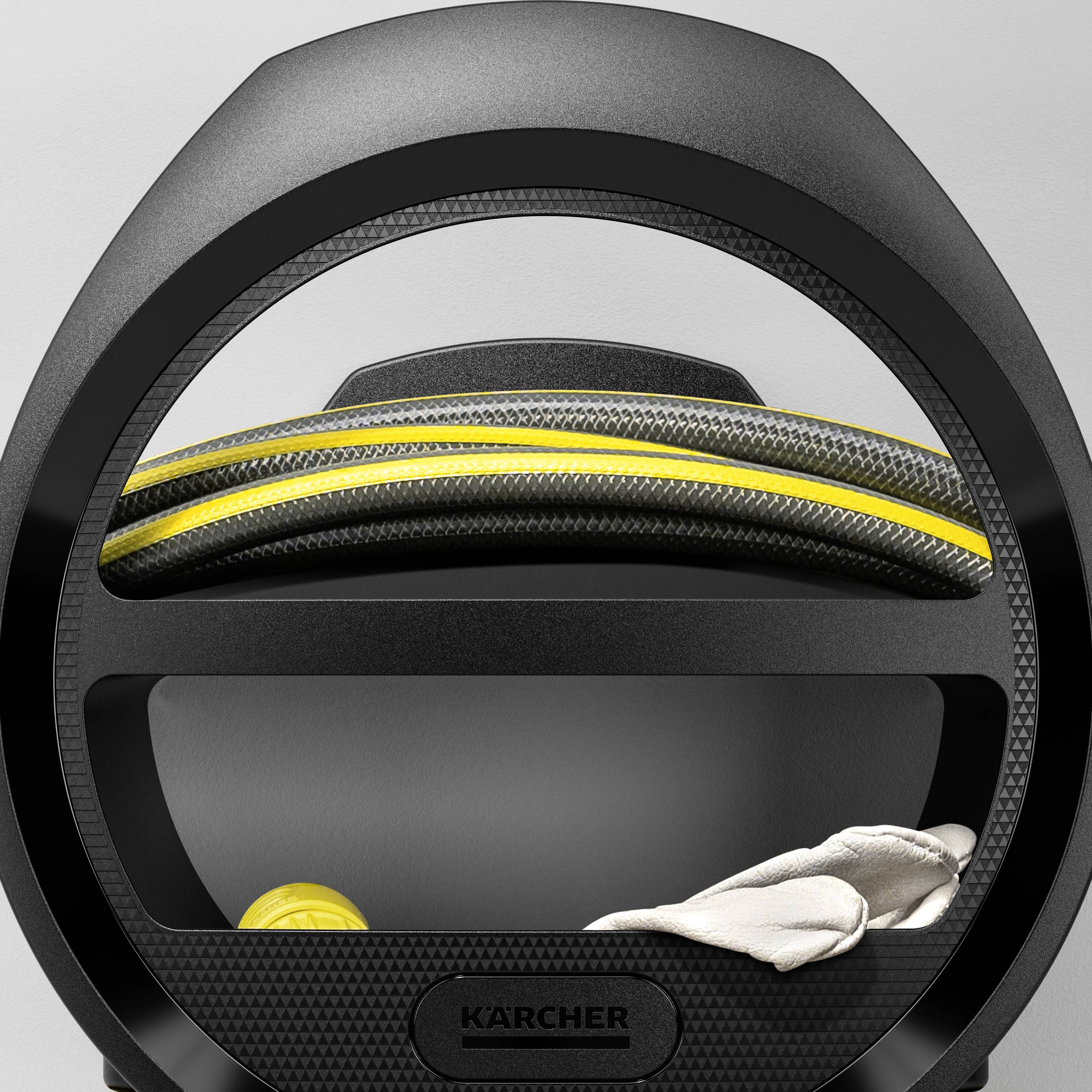 Odkurzacz Kärcher widziany z góry z bliska, z żółtym akcentem, nowoczesnym designem, w zaokrąglonej formie.