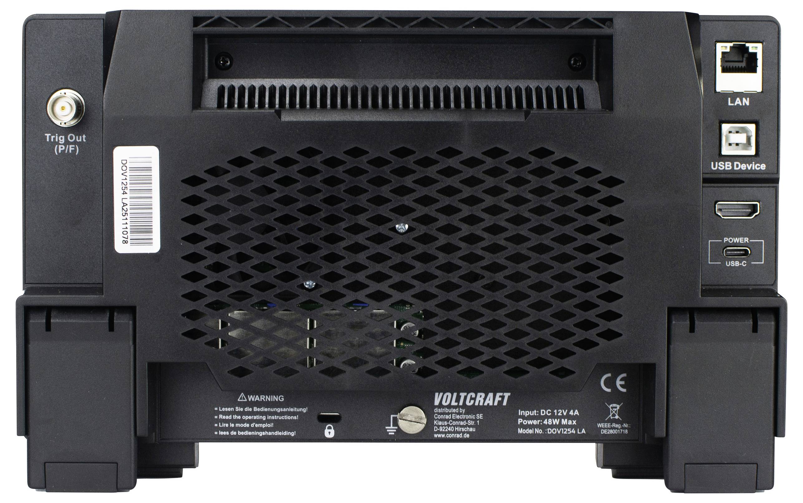 Tylna strona urządzenia elektronicznego z wejściami Trip Out, LAN i USB. Na obudowie widoczna nazwa marki 'VOLTCRAFT' oraz ostrzeżenia.