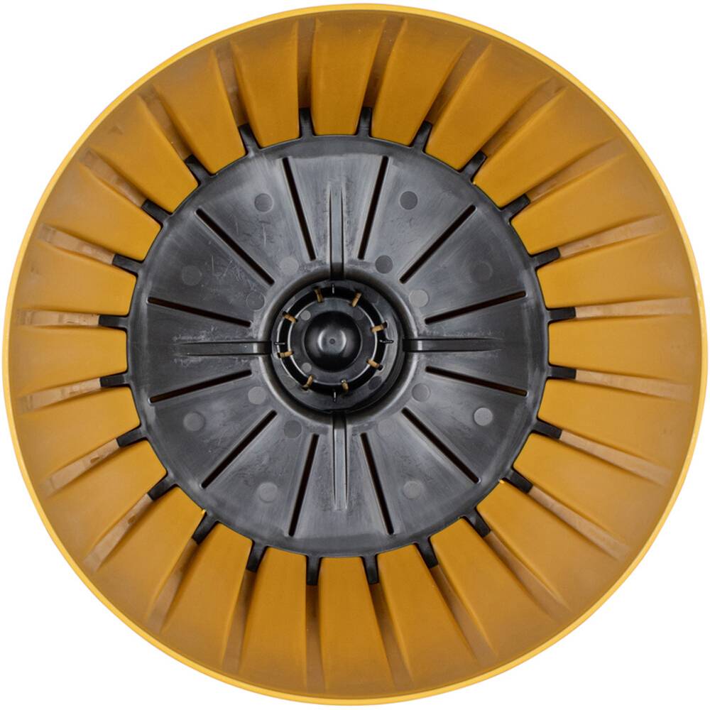 'Żółta i czarna okrągła komponenta z wzorem radialnym i centralnym mechanizmem, prawdopodobnie część urządzenia technicznego.'