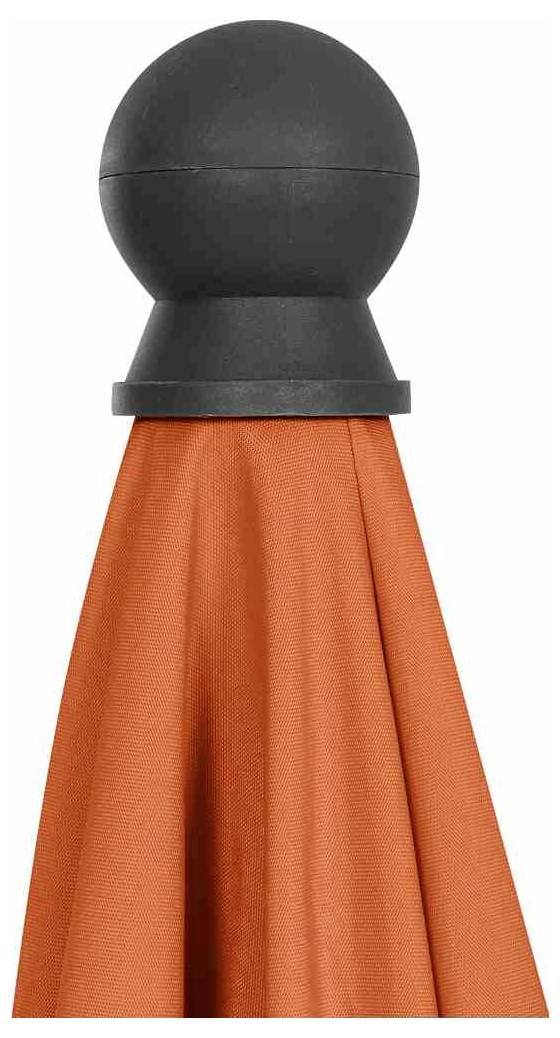 Czarny uchwyt przytrzymuje pomarańczową tkaninę, która jest zadrapowana jak zasłona.