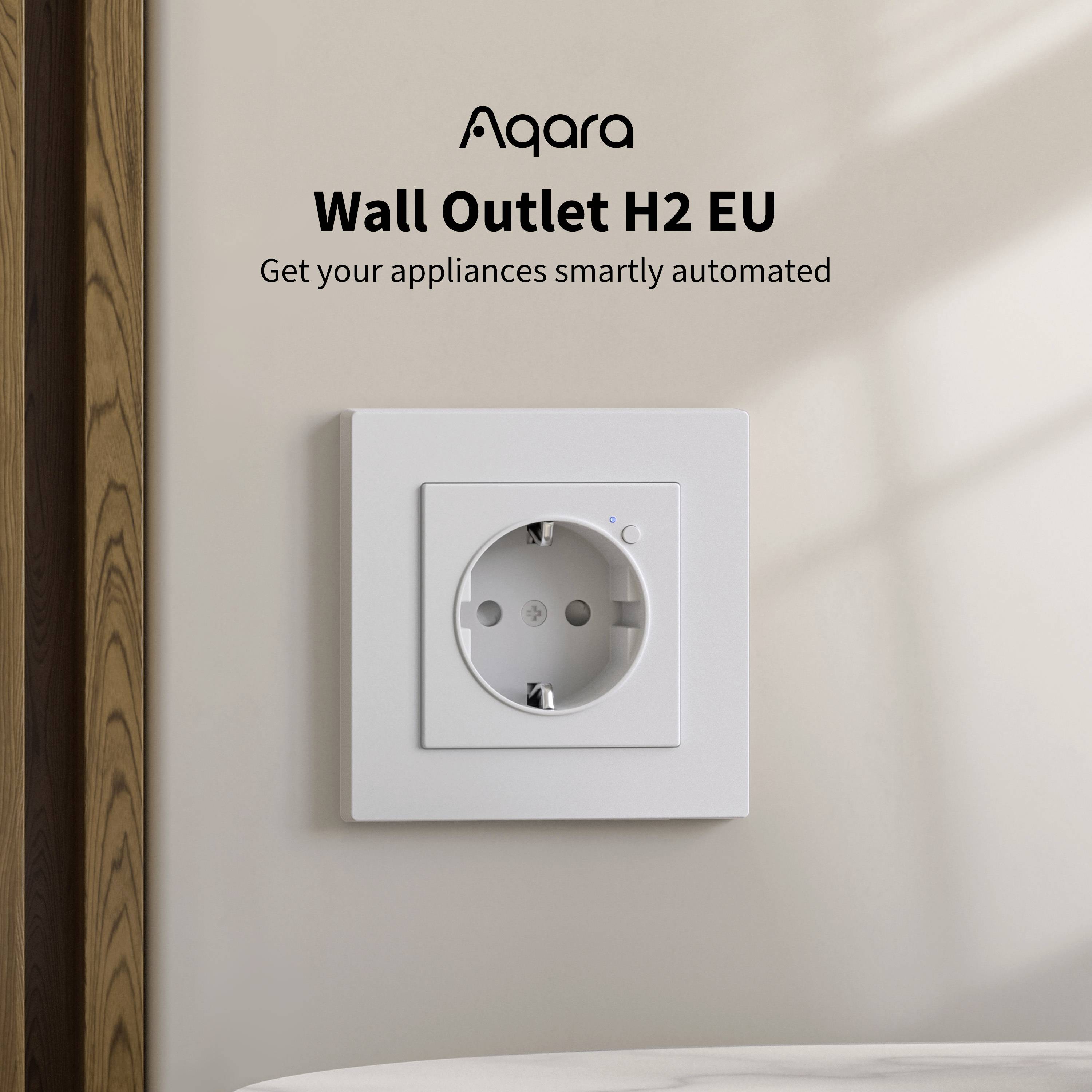 Biała wtyczka na ścianie z napisem 'Aqara Wall Outlet H2 EU'. Tekst: 'Inteligentnie zautomatyzuj swoje urządzenia'.
