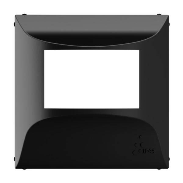 Czarny kwadratowy ramka z dużą, pustą białą przestrzenią pośrodku. W górnej części znajduje się ścięta krawędź. W prawym dolnym rogu symbol 'IP 44'.