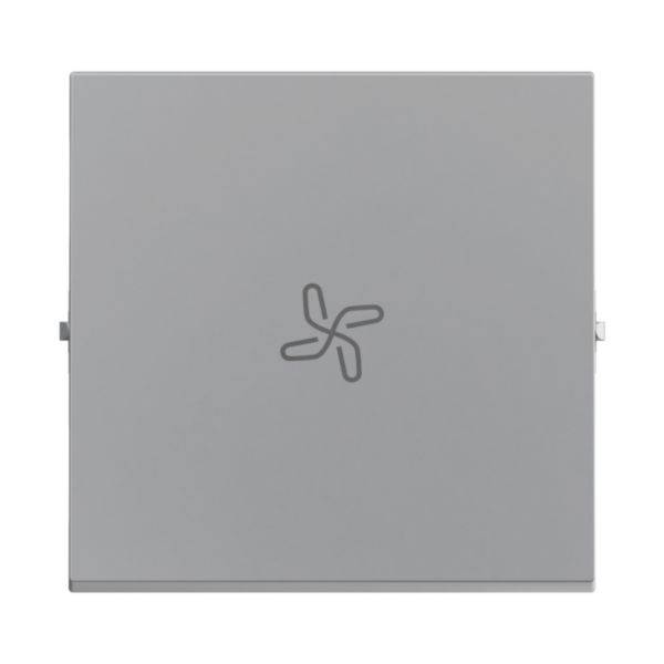 Szary prostokątny element pokrywy, wyśrodkowany symbol wentylatora, prosta stylistyka, bez dodatkowych detali lub ornamentów.