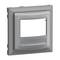 Szary, prostokątny ramka o zaokrąglonych narożnikach z trzema małymi wgłębieniami poniżej, prawdopodobnie przeznaczona pod włącznik światła lub inny panel sterujący.