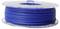 Niebieskie włókno na przezroczystej szpuli, używane do drukarek 3D.