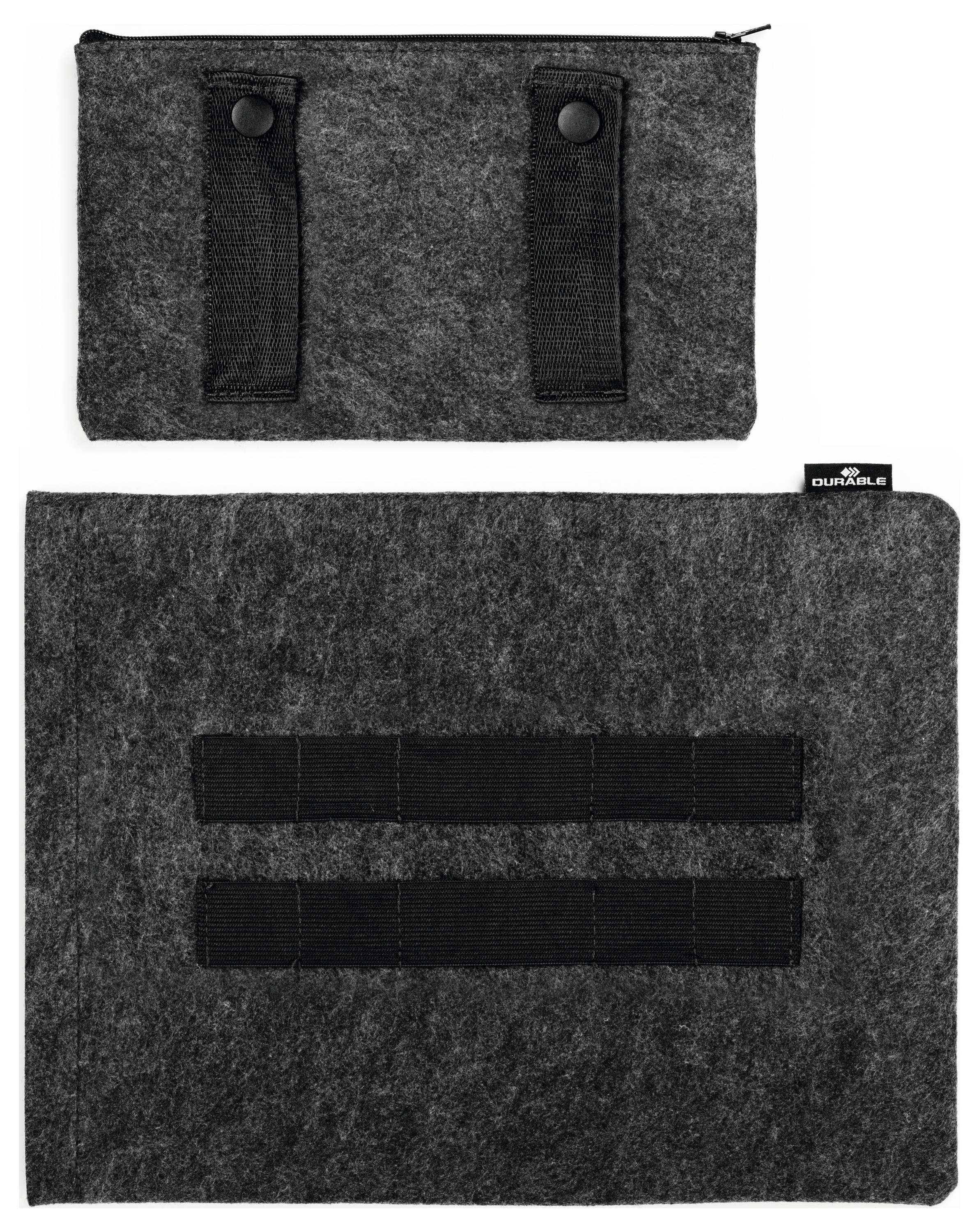 Szara torba filcowa z dwoma pionowymi paskami na tylnej stronie. Na górze dodatkowa, mniejsza kieszeń zamykana na zamek błyskawiczny z dwoma zapięciami paskowymi.